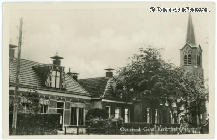 ansichtkaart: Oosterend Leeuwarden, Geref. Kerk met Pastorie